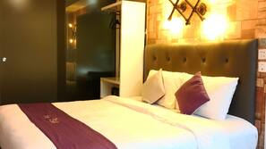 Free minibar, in-room safe, desk, iron/ironing board
