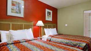 Desk, iron/ironing board, bed sheets