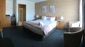 Premium bedding, Tempur-Pedic beds, desk, blackout curtains