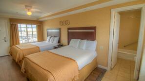 Pillowtop beds, desk, laptop workspace, blackout drapes