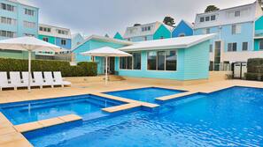 Seasonal outdoor pool, pool umbrellas
