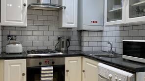 Fridge, microwave, oven, hob