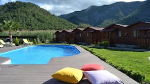 Outdoor pool, pool umbrellas, sun loungers