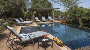 Outdoor pool, pool umbrellas, pool loungers