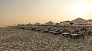 Private beach, beach umbrellas, beach towels, surfing