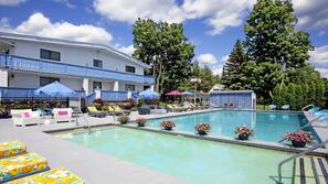 Indoor pool, seasonal outdoor pool, pool umbrellas, pool loungers