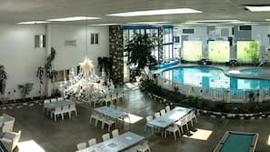 Indoor pool, seasonal outdoor pool, pool umbrellas, pool loungers