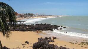 Na praia, toalhas de praia