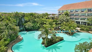 2 outdoor pools, open 8:00 AM to 8:00 PM, pool umbrellas, pool loungers