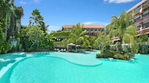 2 outdoor pools, open 8:00 AM to 8:00 PM, pool umbrellas, pool loungers