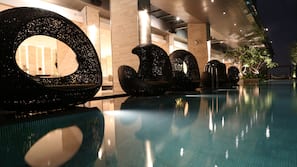 Outdoor pool, pool umbrellas, sun loungers