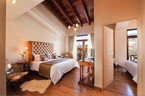 King Suite | Premium bedding, minibar, in-room safe, individually decorated