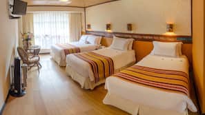 Roupas de cama premium, frigobar, cofres nos quartos, Wi-Fi de cortesia
