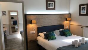 Literie de qualité supérieure, minibar, décoration personnalisée