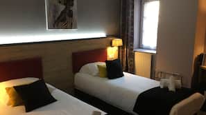 Literie de qualité supérieure, minibar, décoration personnalisée