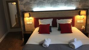 Literie de qualité supérieure, minibar, décoration personnalisée