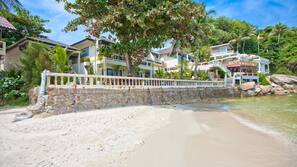 On the beach, white sand, beach towels