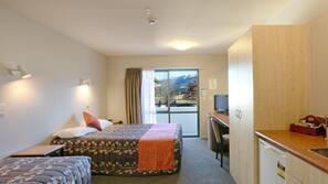 Desk, blackout curtains, free cots/infant beds, free WiFi