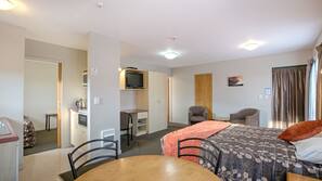 Desk, blackout curtains, free cots/infant beds, free WiFi