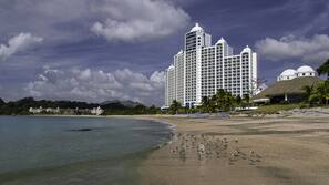 Private beach, beach umbrellas, beach towels, beach volleyball