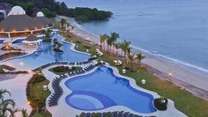 3 outdoor pools, pool umbrellas, sun loungers