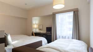 Down comforters, desk, blackout drapes, iron/ironing board