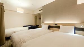 Down comforters, desk, blackout drapes, iron/ironing board