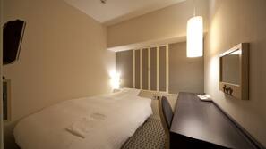 Down comforters, desk, blackout drapes, iron/ironing board