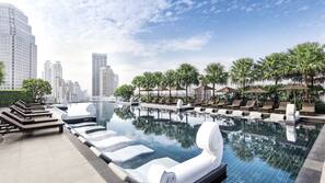 Outdoor pool, pool umbrellas, pool loungers