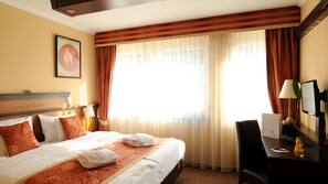 Pillow-top beds, minibar, in-room safe, desk