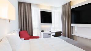 Free minibar, in-room safe, desk, blackout curtains