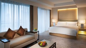 Premium bedding, down comforters, in-room safe, desk