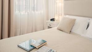 Lenzuola Frette, biancheria da letto di alta qualità, minibar