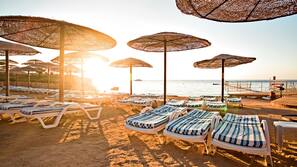 Private beach, sun-loungers, beach umbrellas, beach towels