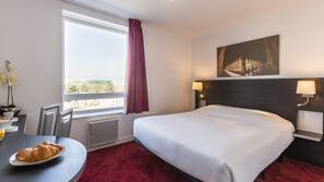 Roupas de cama premium, quartos à prova de som, Wi-Fi de cortesia