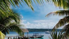 On the beach, sun-loungers, beach towels, snorkelling