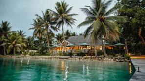 On the beach, sun-loungers, beach towels, snorkelling