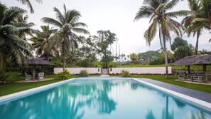 Outdoor pool, pool umbrellas, pool loungers