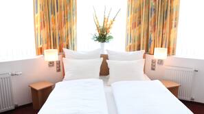 Hypoallergeen beddengoed, een minibar, een bureau, gratis wifi