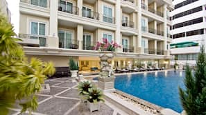 Outdoor pool, open 7 AM to 7 PM, pool umbrellas, sun loungers