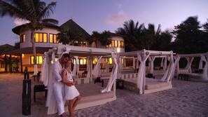On the beach, white sand, free beach cabanas, sun loungers