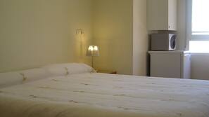 Down comforters, desk, iron/ironing board, cribs/infant beds