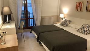 1 dormitorio, colchones con acolchado adicional, escritorio