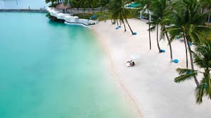 Private beach, beach umbrellas, beach towels, scuba diving