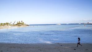 Private beach, beach umbrellas, beach towels, scuba diving