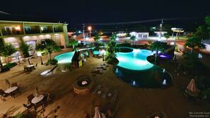 Seasonal outdoor pool, open 10 AM to 10 PM, pool umbrellas, sun loungers