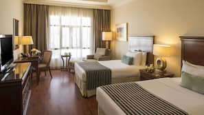 Hypo-allergenic bedding, down comforters, minibar, in-room safe