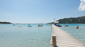 On the beach, white sand, windsurfing, beach bar