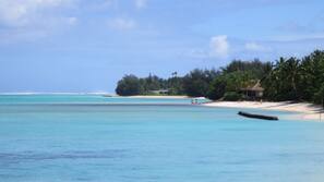 On the beach, white sand, beach towels, snorkelling
