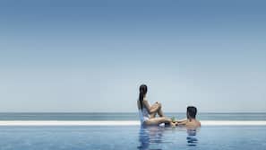 Outdoor pool, pool umbrellas, sun loungers